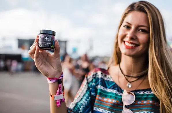 woman-with-cbd-isolate-jar